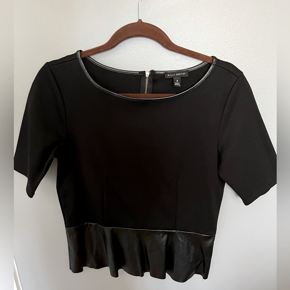 Black Willie Smith shirt with faux leather trim and peplum bottom